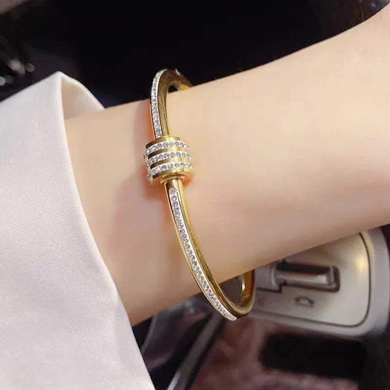 Stainless Steel Gold Plated American Diamond Studded Bangle Style Anti-Tarnish Bracelet