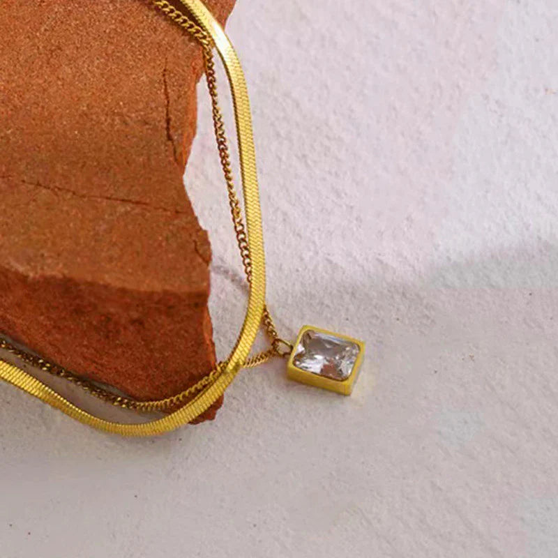 Elegant Layered Gold Necklace with Rectangular Crystal Pendant