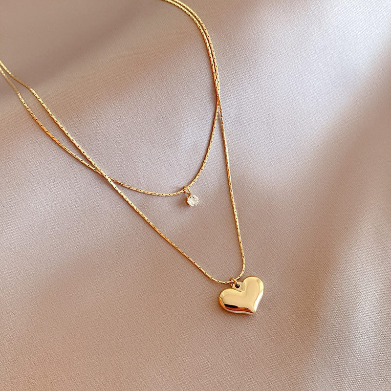 Elegant Double-Layer Heart & Crystal Pendant Necklace – 18K Gold-Plated
