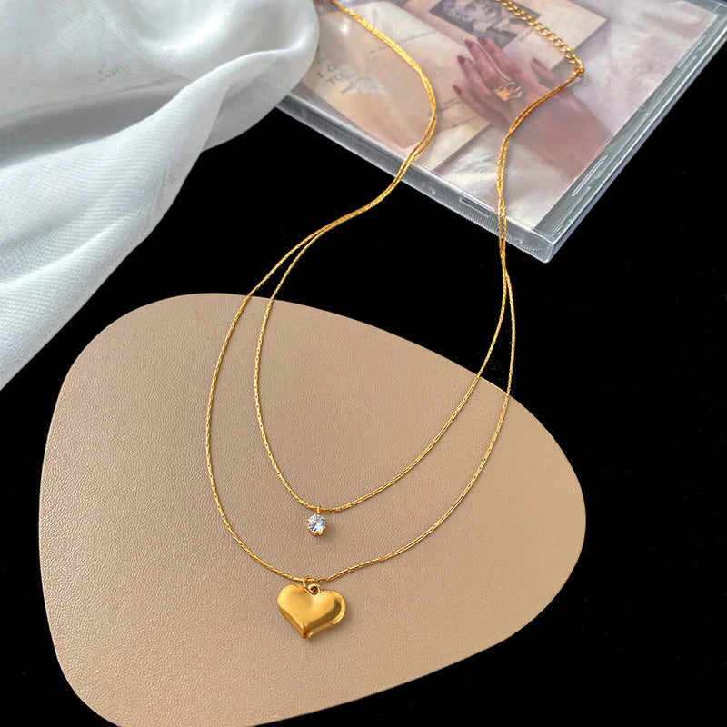 Elegant Double-Layer Heart & Crystal Pendant Necklace – 18K Gold-Plated