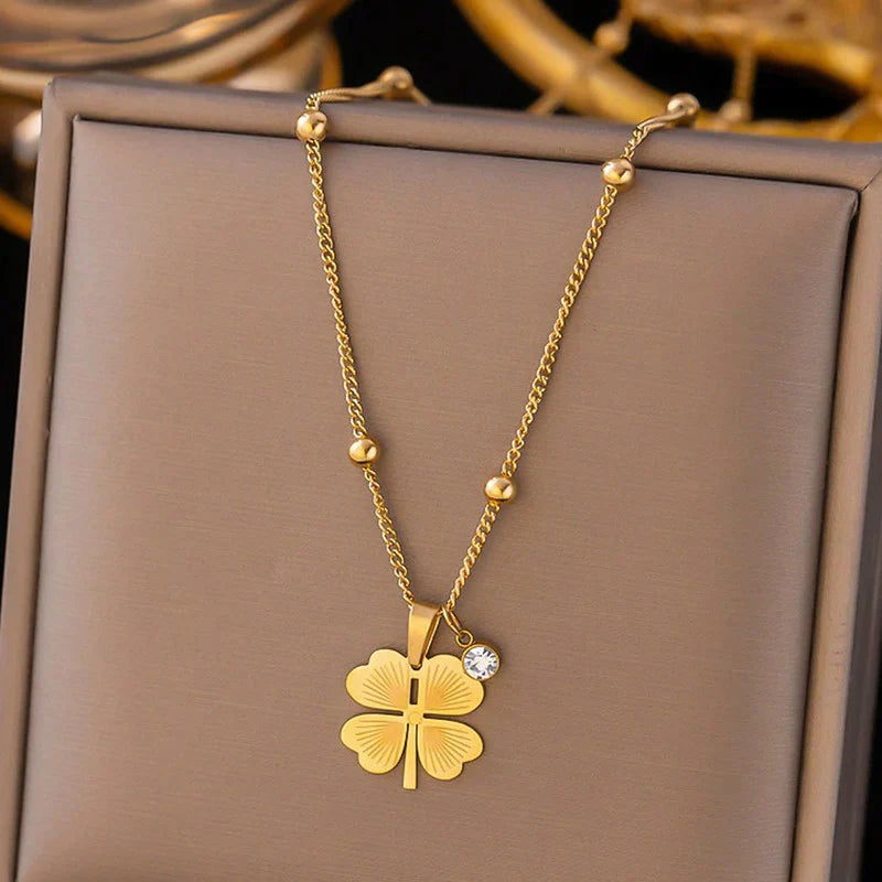 Elegant Gold Four-Leaf Clover Pendant Necklace with Crystal Charm