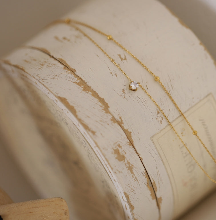 Layered Gold Chain Necklace with Solitaire Pendant