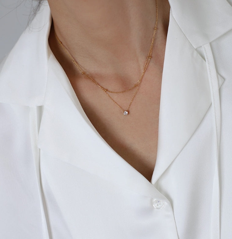 Layered Gold Chain Necklace with Solitaire Pendant