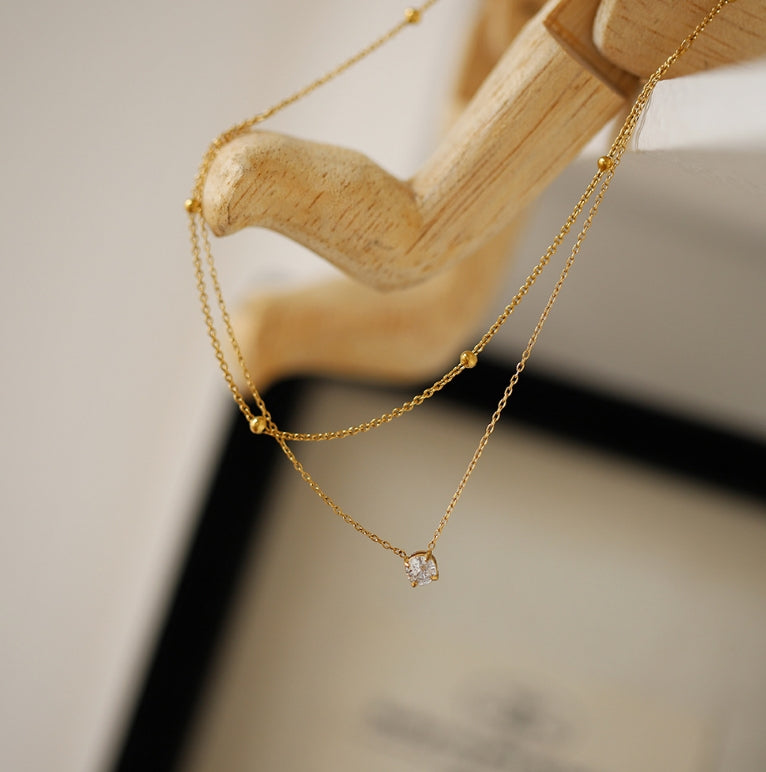 Layered Gold Chain Necklace with Solitaire Pendant