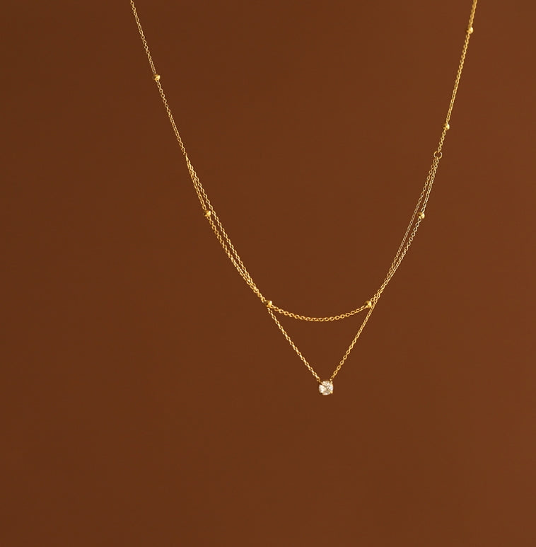 Layered Gold Chain Necklace with Solitaire Pendant