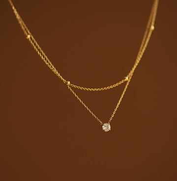 Layered Gold Chain Necklace with Solitaire Pendant